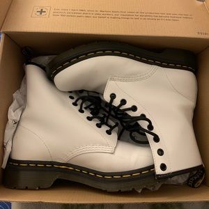 White pair of Dr. Martin boots!